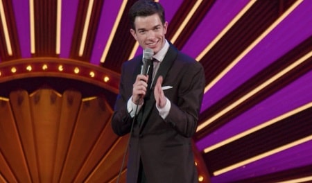 A picture of John Mulaney performing at his show 'Kid Gorgeous  Radio City'. 